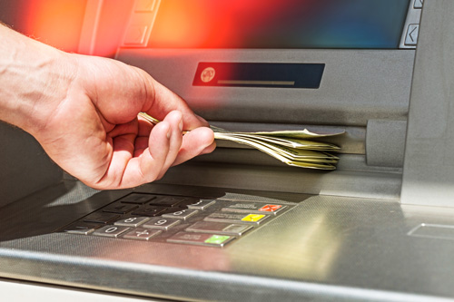 Customer using an ATM